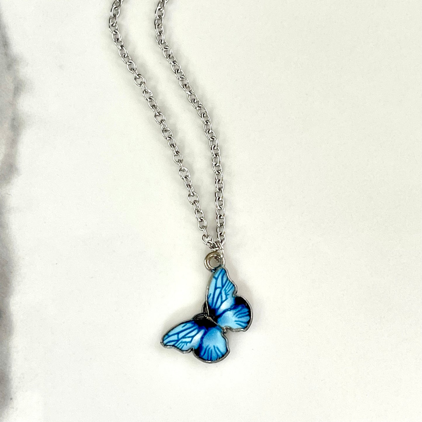 Blue Butterfly In Dolly We Trust Necklace