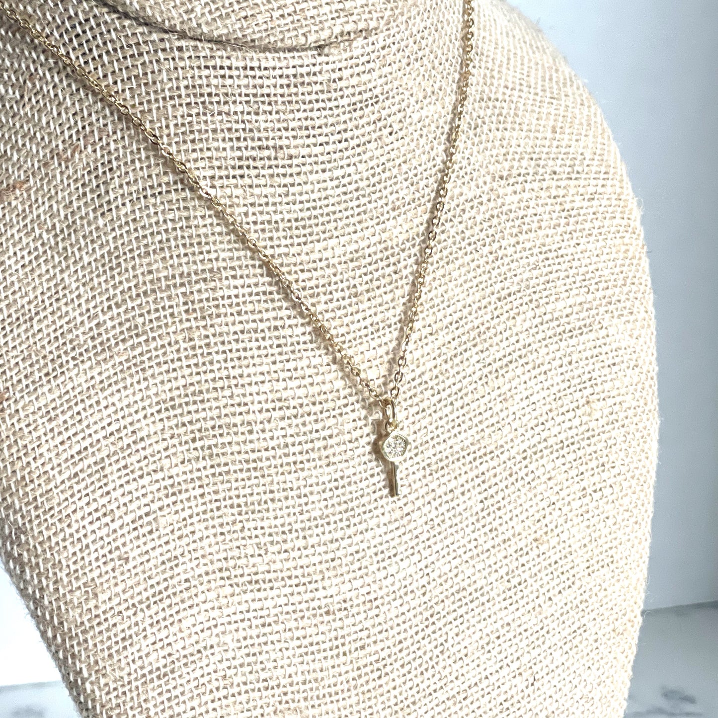 Tiny Pave Key Charm Necklace. Glass Vial Display